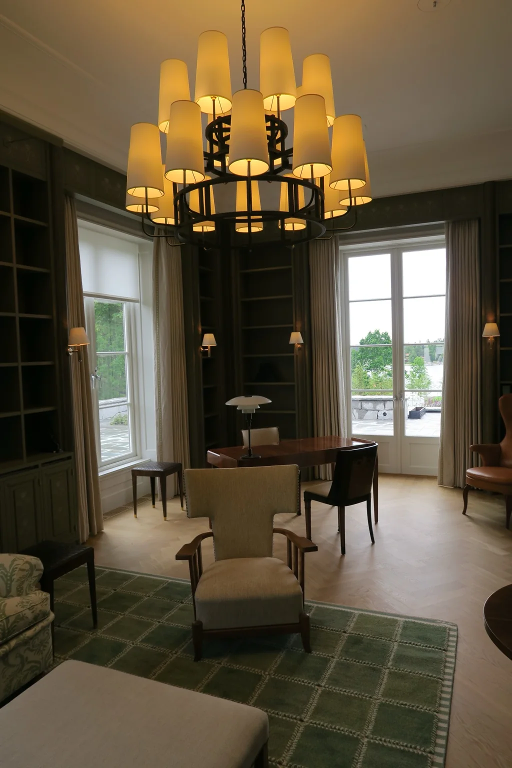 Formal drawing room with integrated blinds and curtains