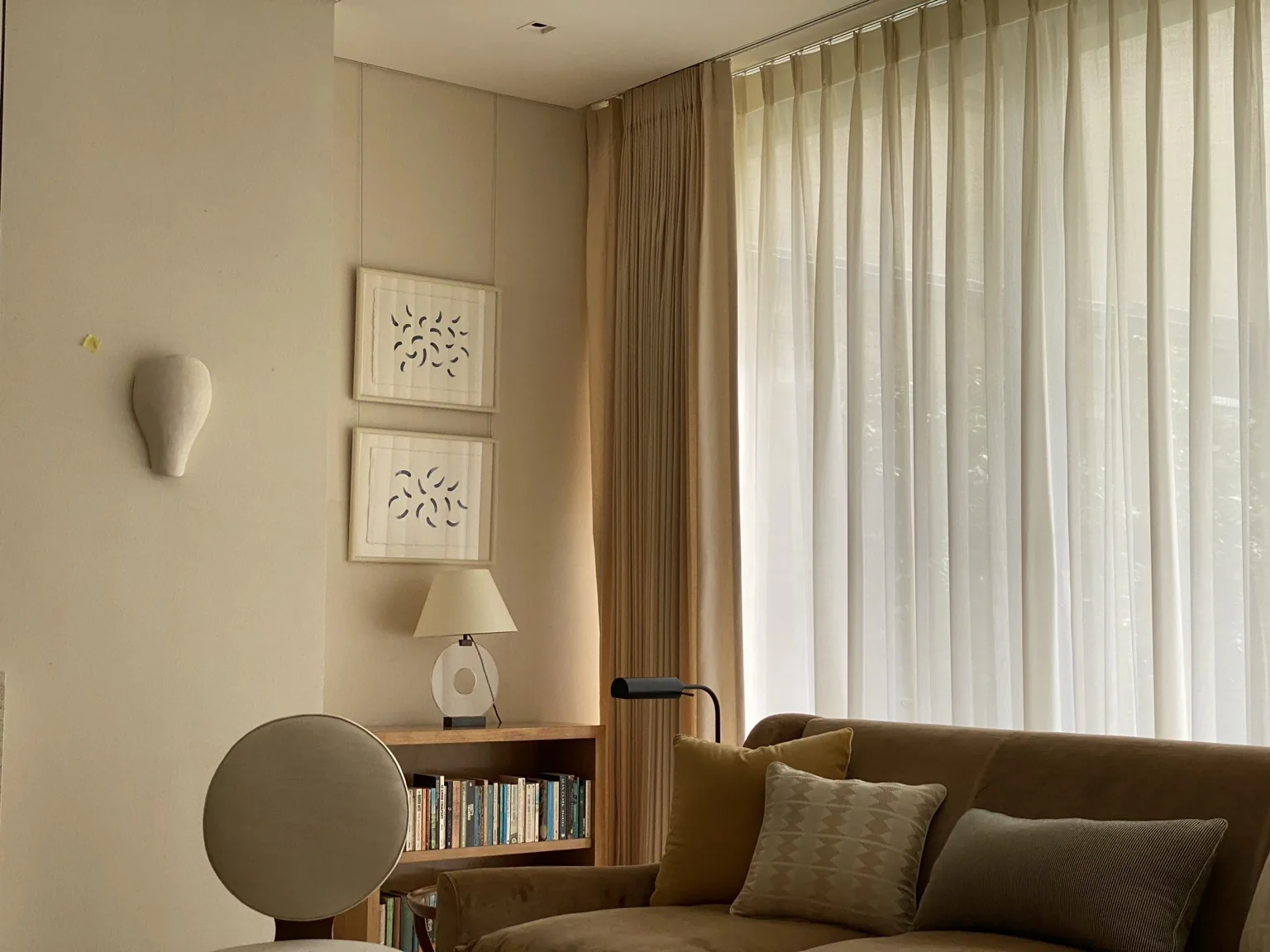 Sheer curtains filtering daylight in a calm interior